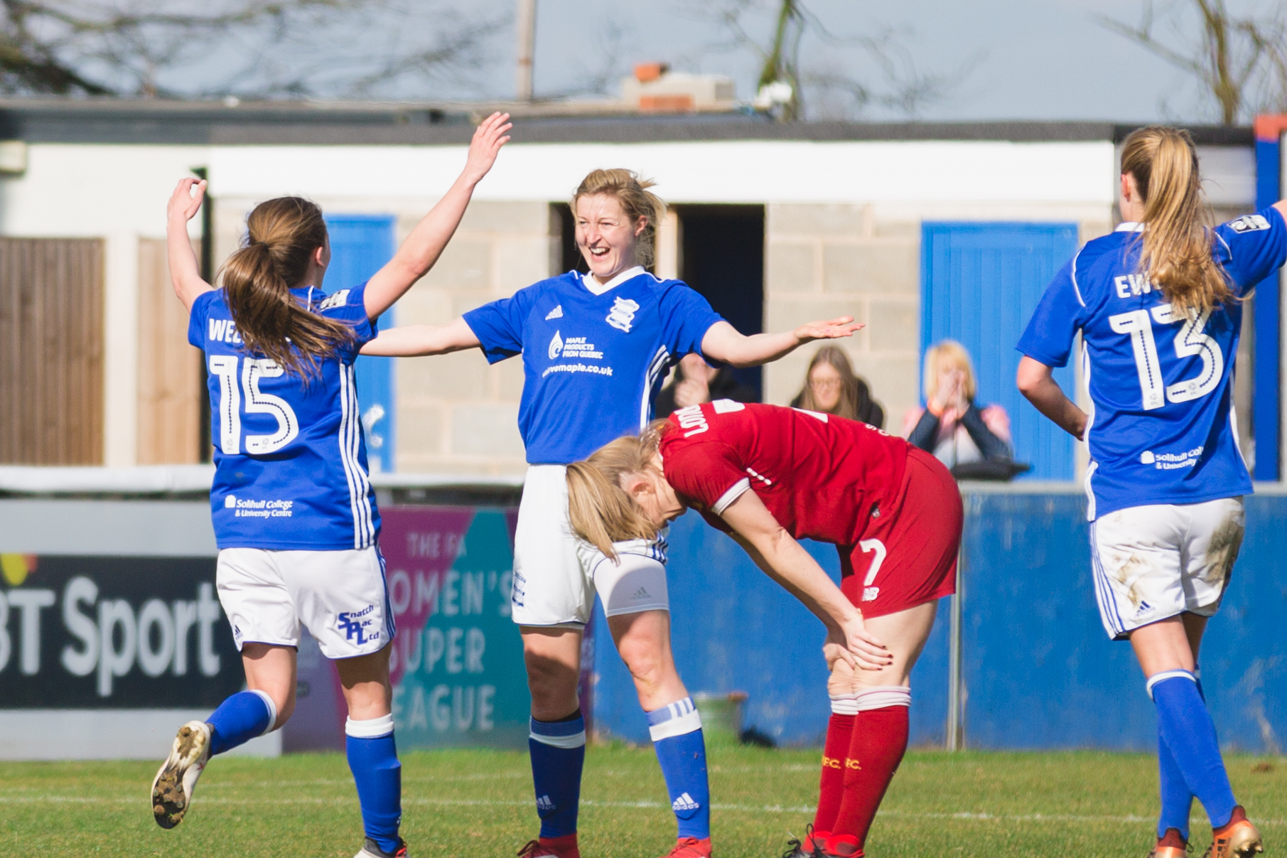 Birmingham City Ladies FC players celebrating 