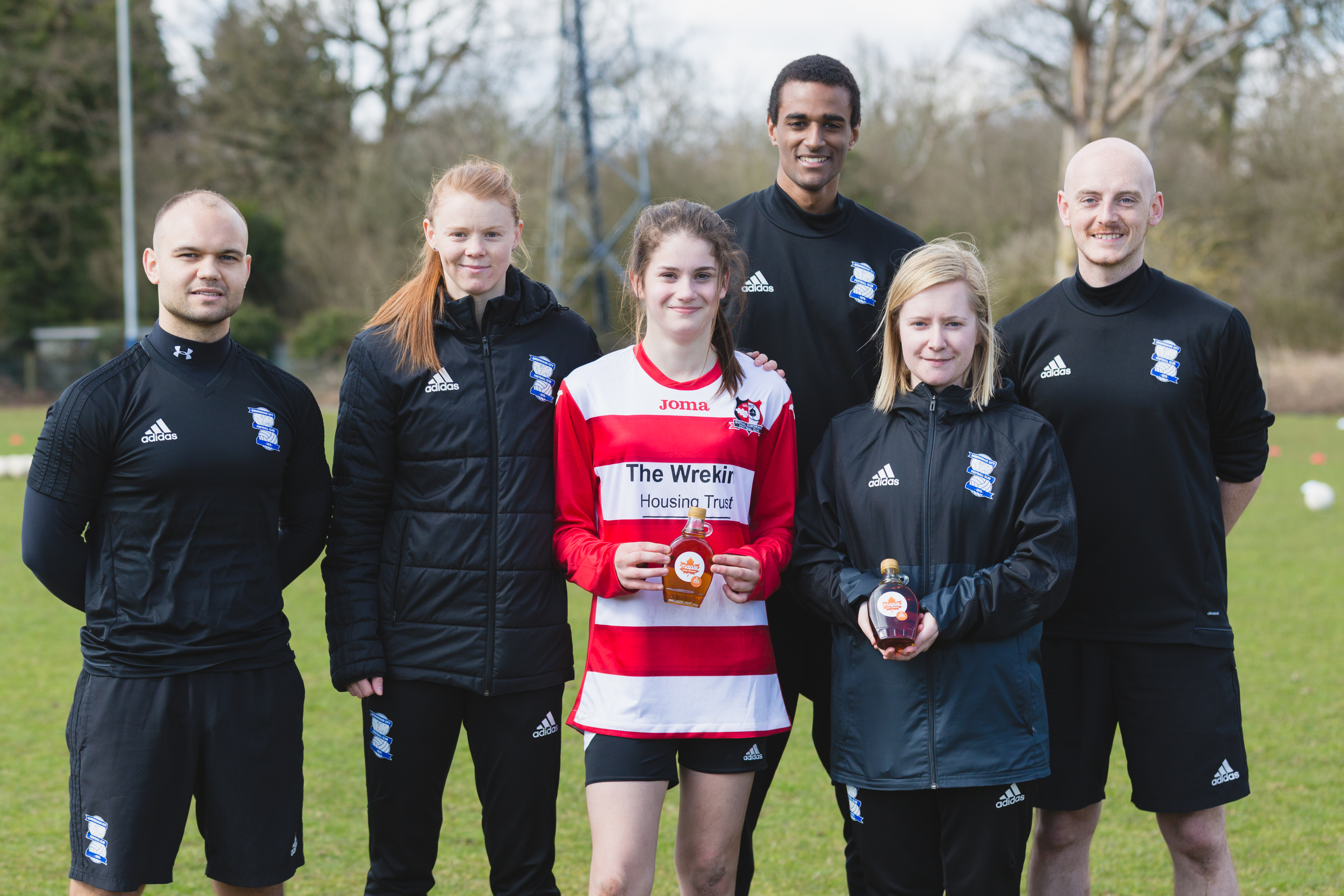 Maple from Canada winners: Lexie, Grace and Lauren with coaches