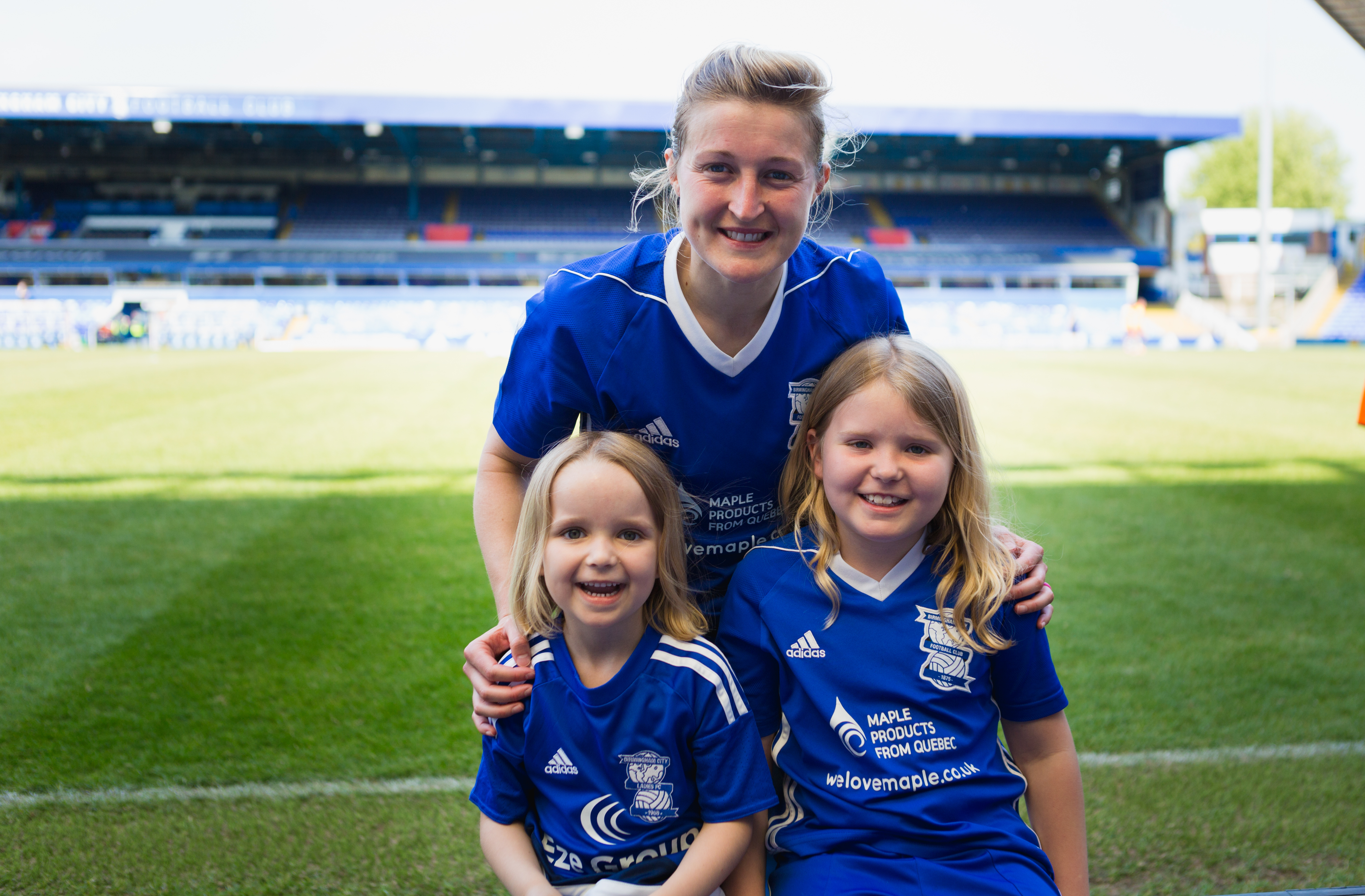 Birmingham City Ladies FC players taking pictures with young fans