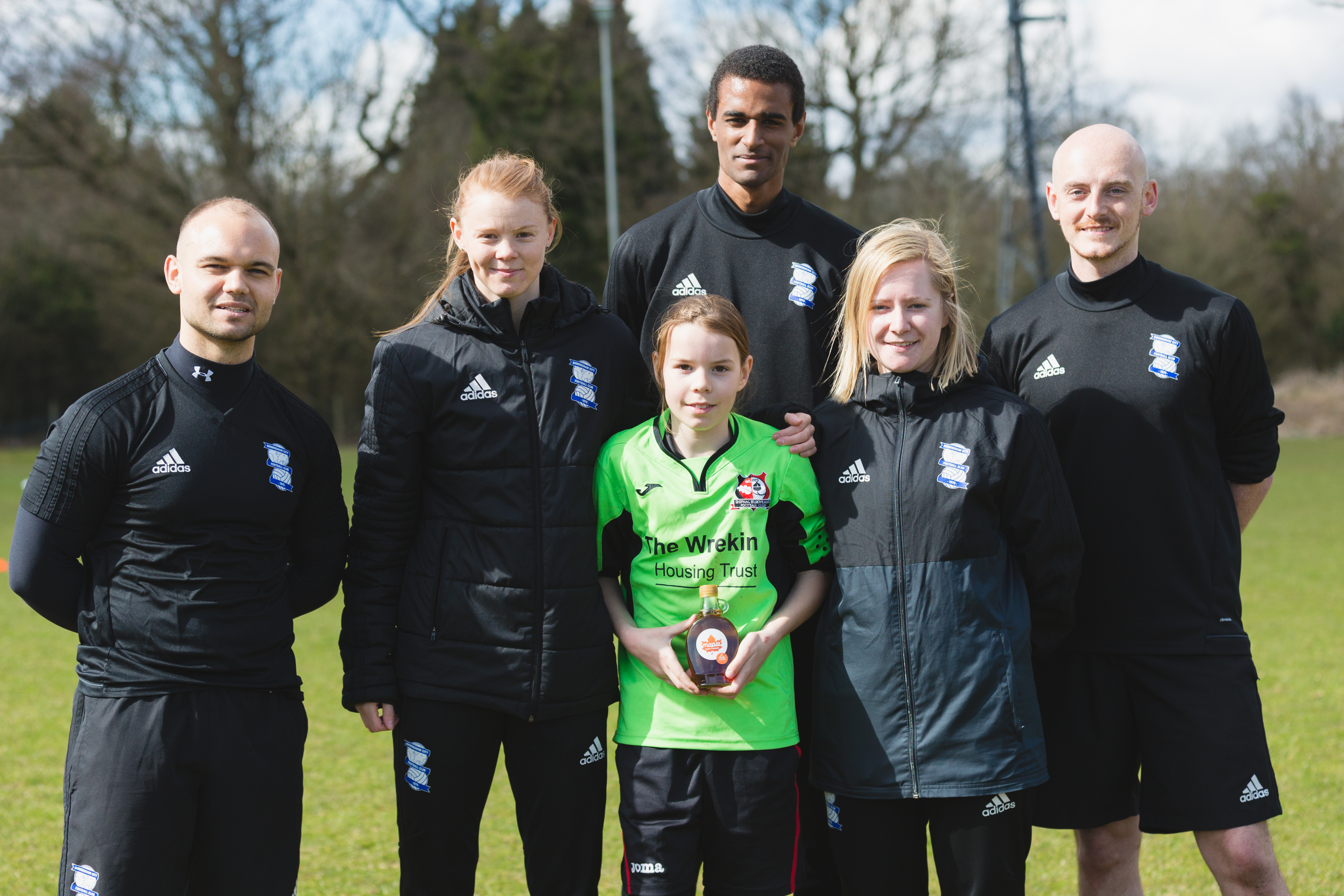 Maple from Canada winners: Lexie, Grace and Lauren with coaches