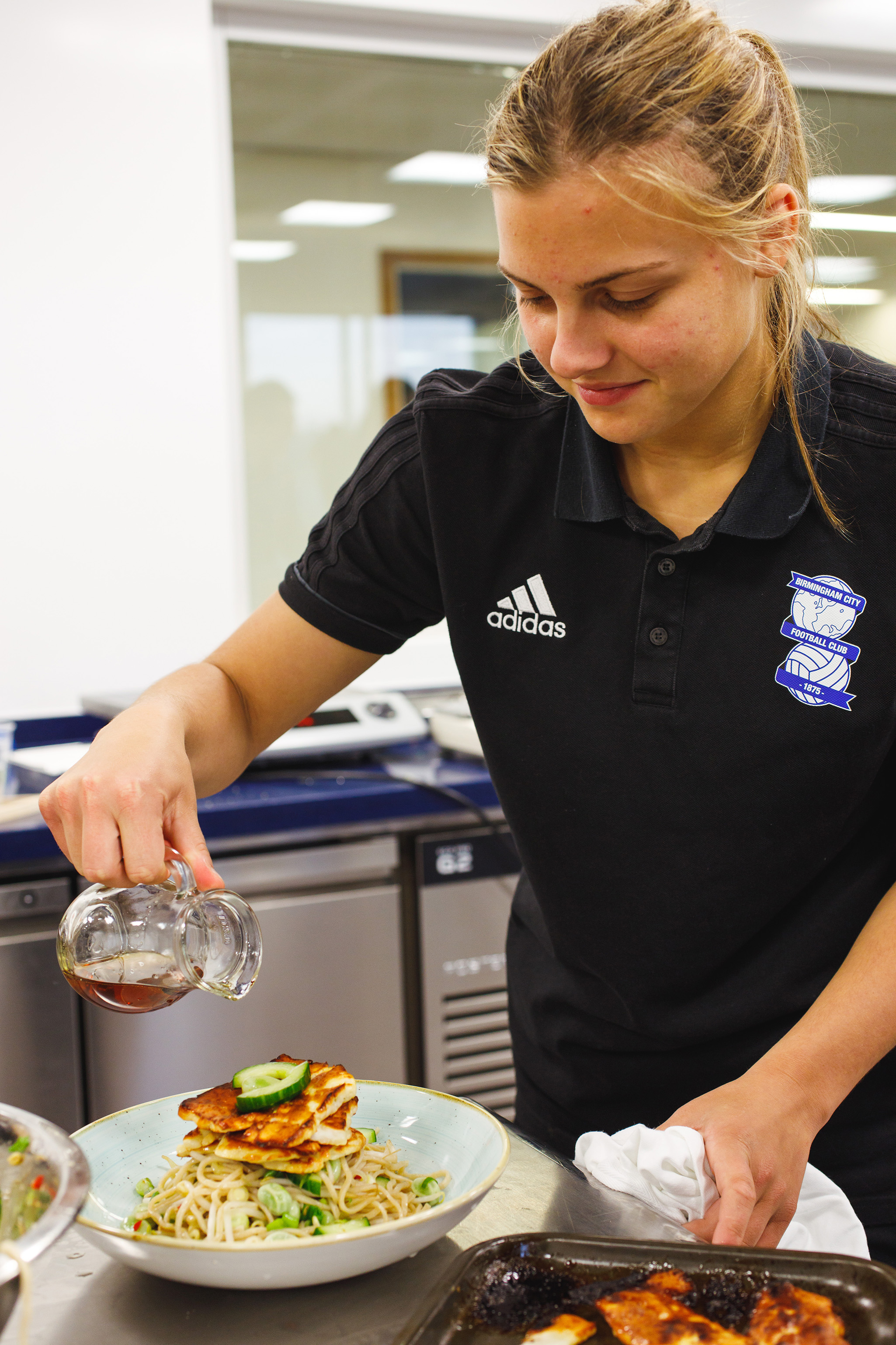 Birmingham city Ladies FC player making a maple infused lunch