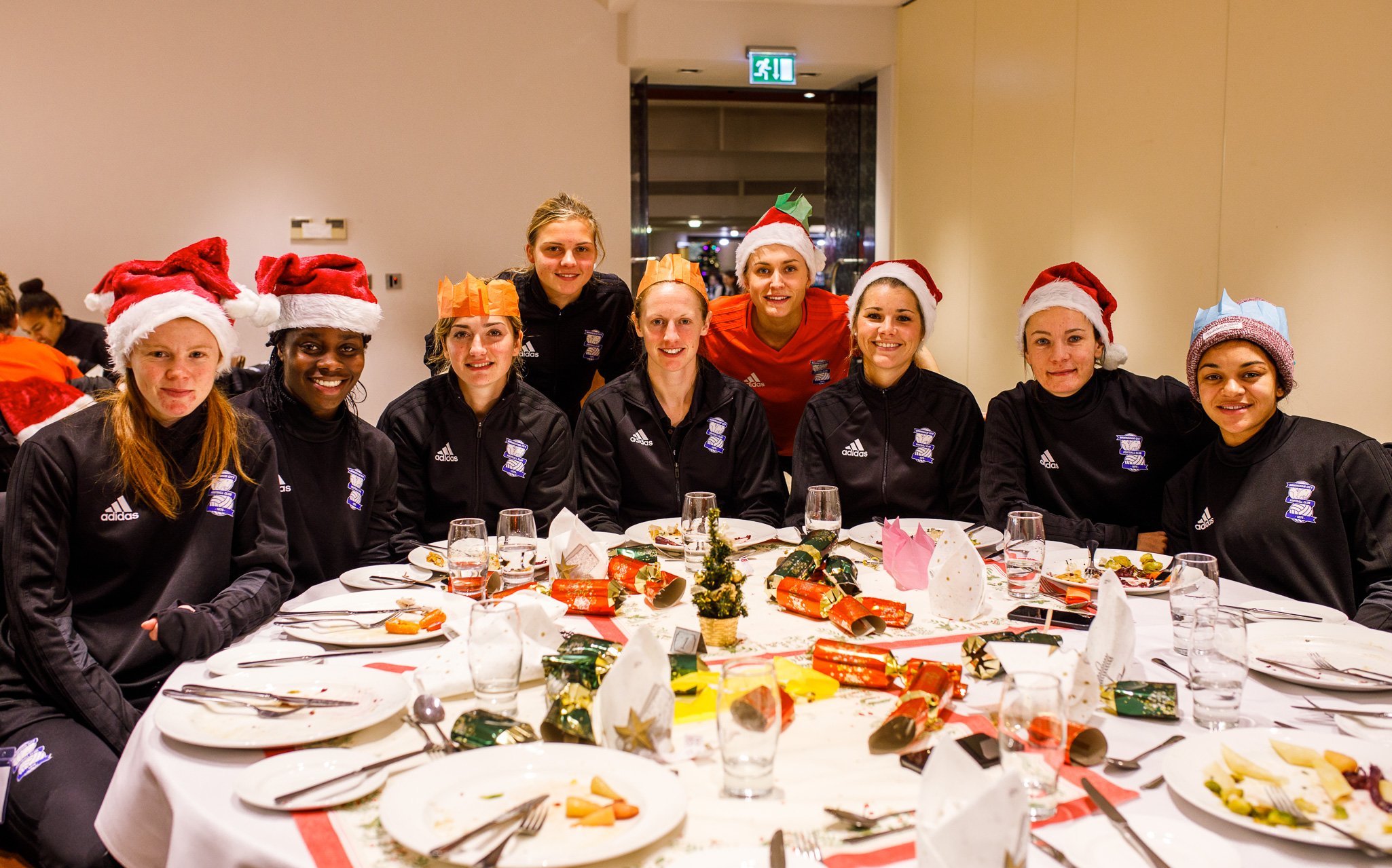 Birmingham City Ladies FC players awaiting their Christmas feast