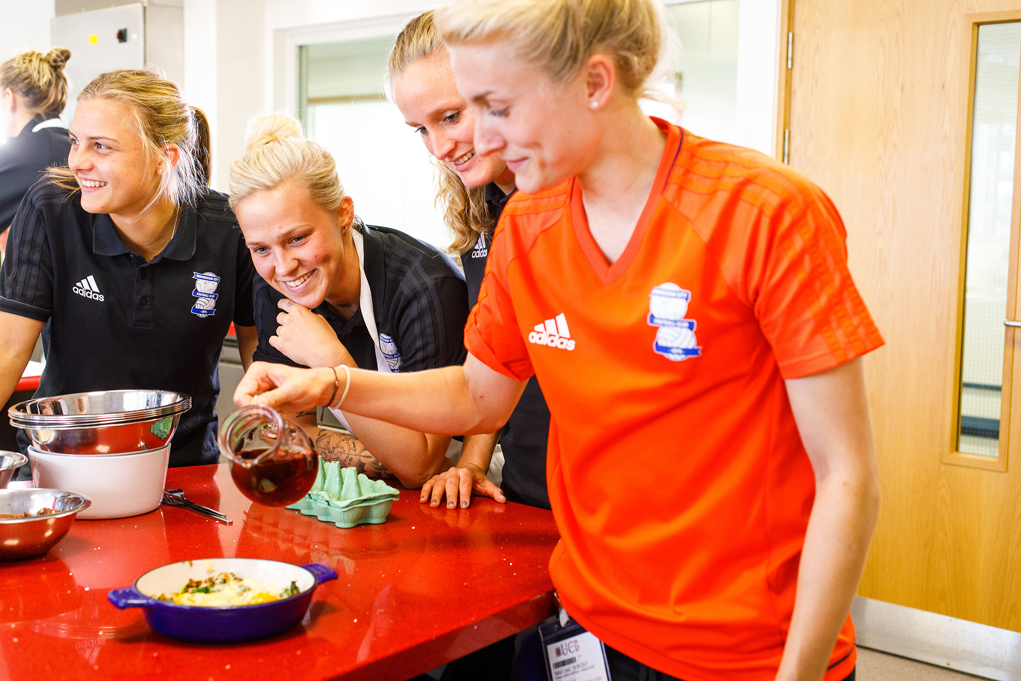 Birmingham City Ladies using maple syrup in their cooking 