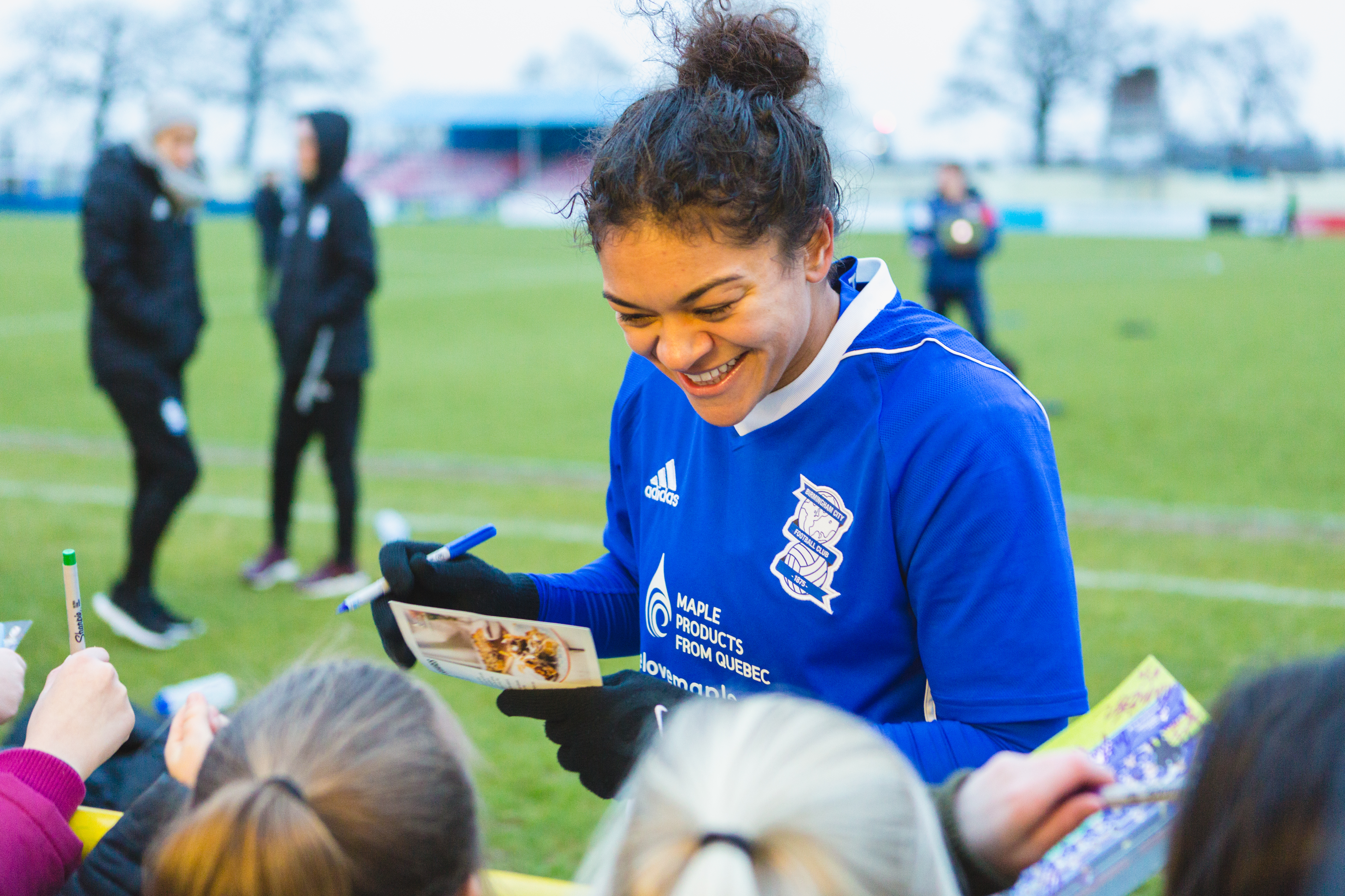 Birmingham City Ladies FC player signing autographs