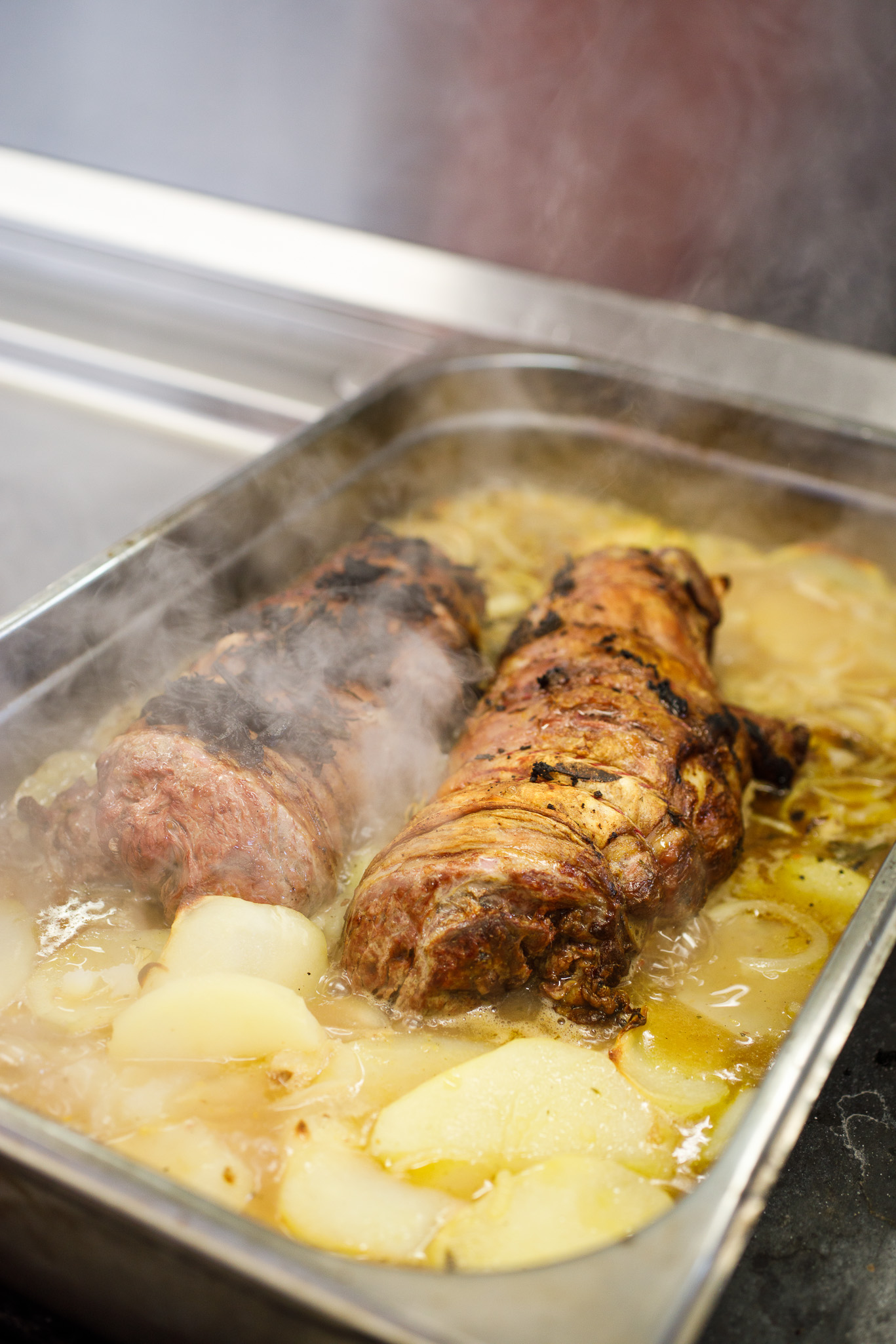 marinated joint of lamb with maple, fennel, citrus and potatoes