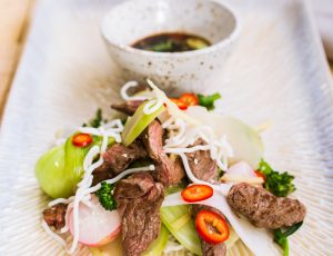 Beef and noodle stir-fry with maple Asian greens