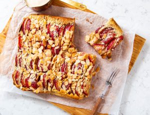 Maple-soaked plum and almond tray bake