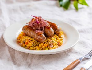 Toulouse Sausage with Maple-Glazed Onions and Lentils