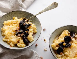 Creamed polenta with cinnamon and maple prunes