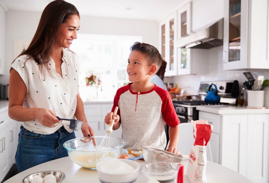 Mother and son cooking