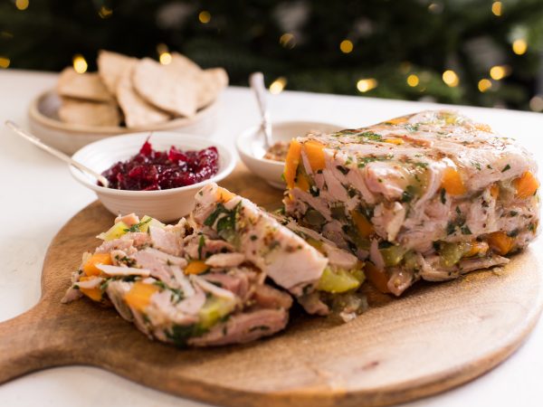 Maple Ham Hock Terrine on a wooden chopping board